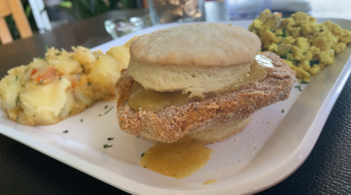 Souly Vegan Cafe home fries, Large Chicken Biscuit (with gravy) and tofu scramble